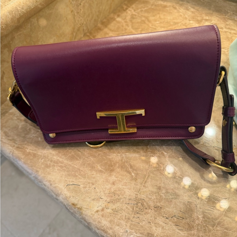Tod's Plum Crossbody Bag with Gold Accent